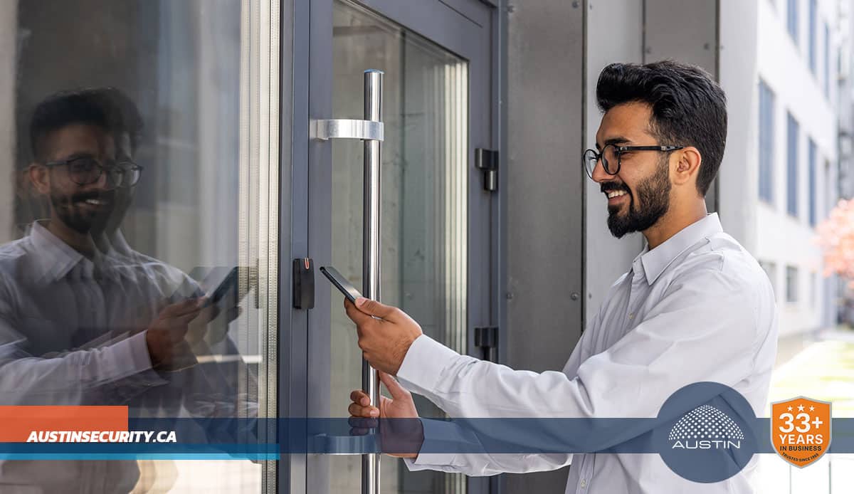 Man using smartphone to access secured door