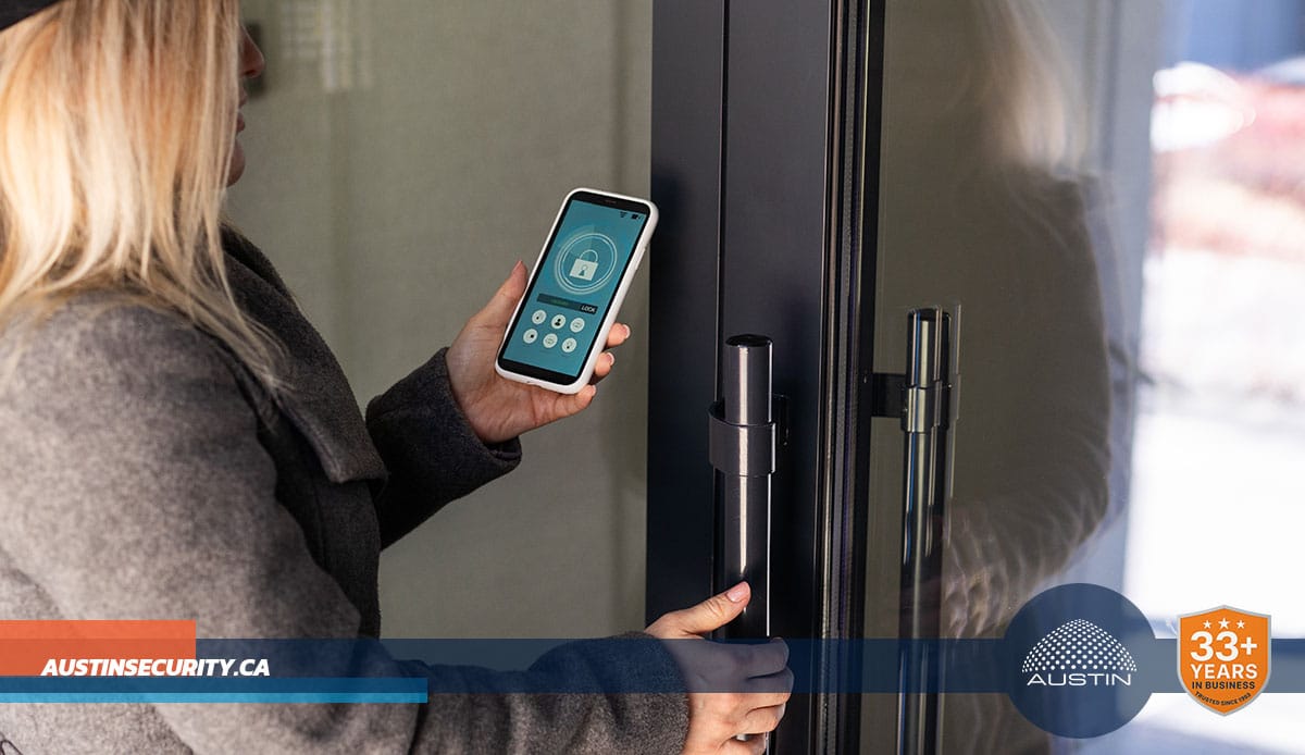 Person unlocking door with smartphone.