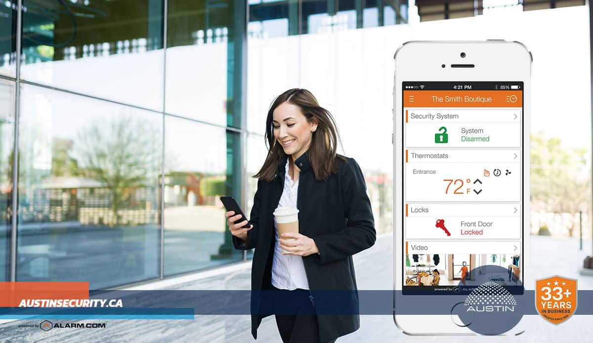 Woman using smartphone with security app interface.